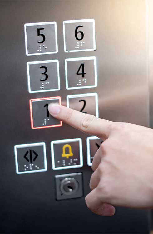 Braille on elevator buttons in barrier-free elevator