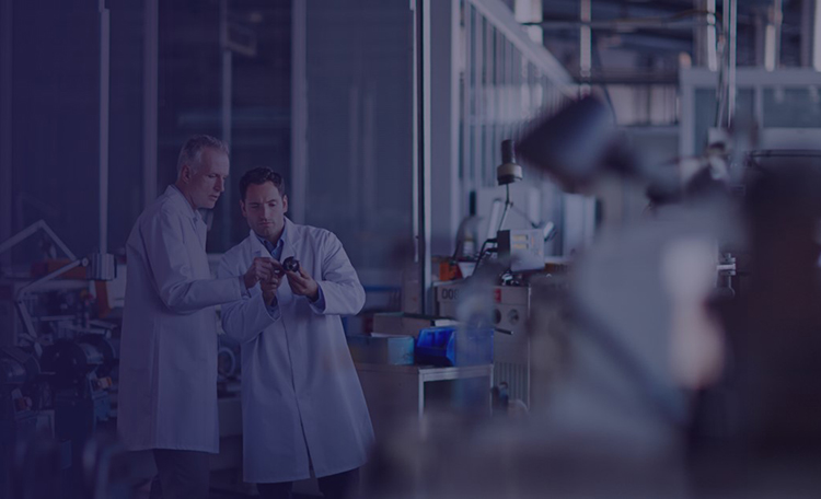 2 men in a  laboratory