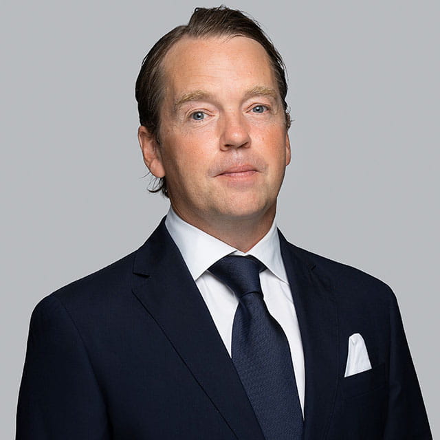 Carl Fagerstrom dark suit and tie