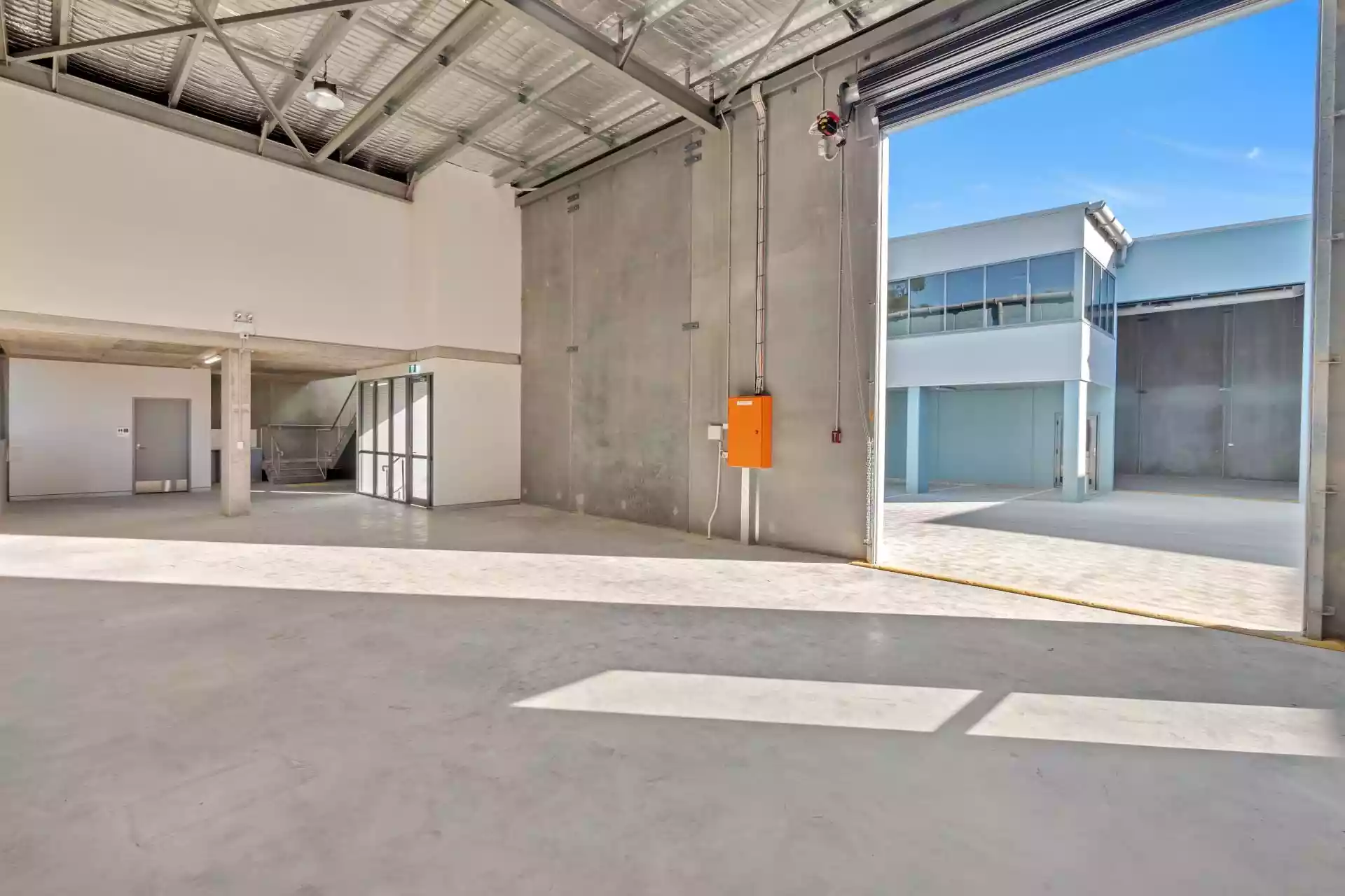 Occupy Now - Modern, high clearance warehouse with air-conditioned office